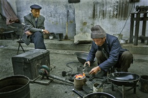 《补锅》