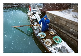 《风雪卖鱼人》